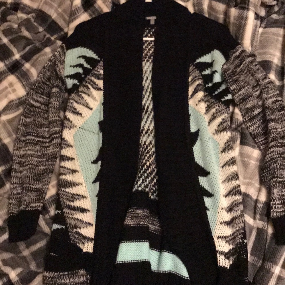 Black, blue and white thick cardigan.